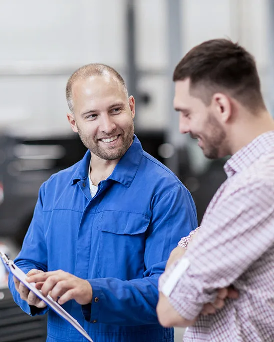 A consultation beside a car — an illustrative photo from the official Shop For Cars website